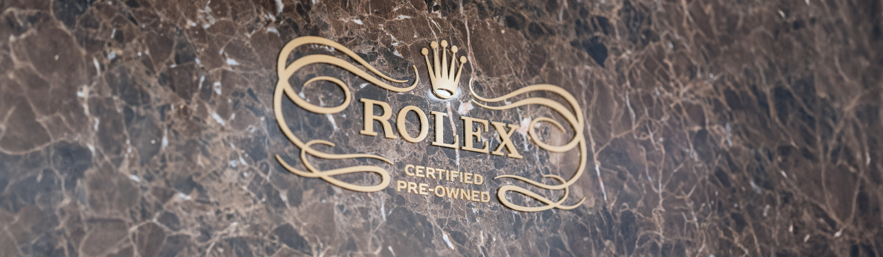 Rolex watch with leather strap facing the front